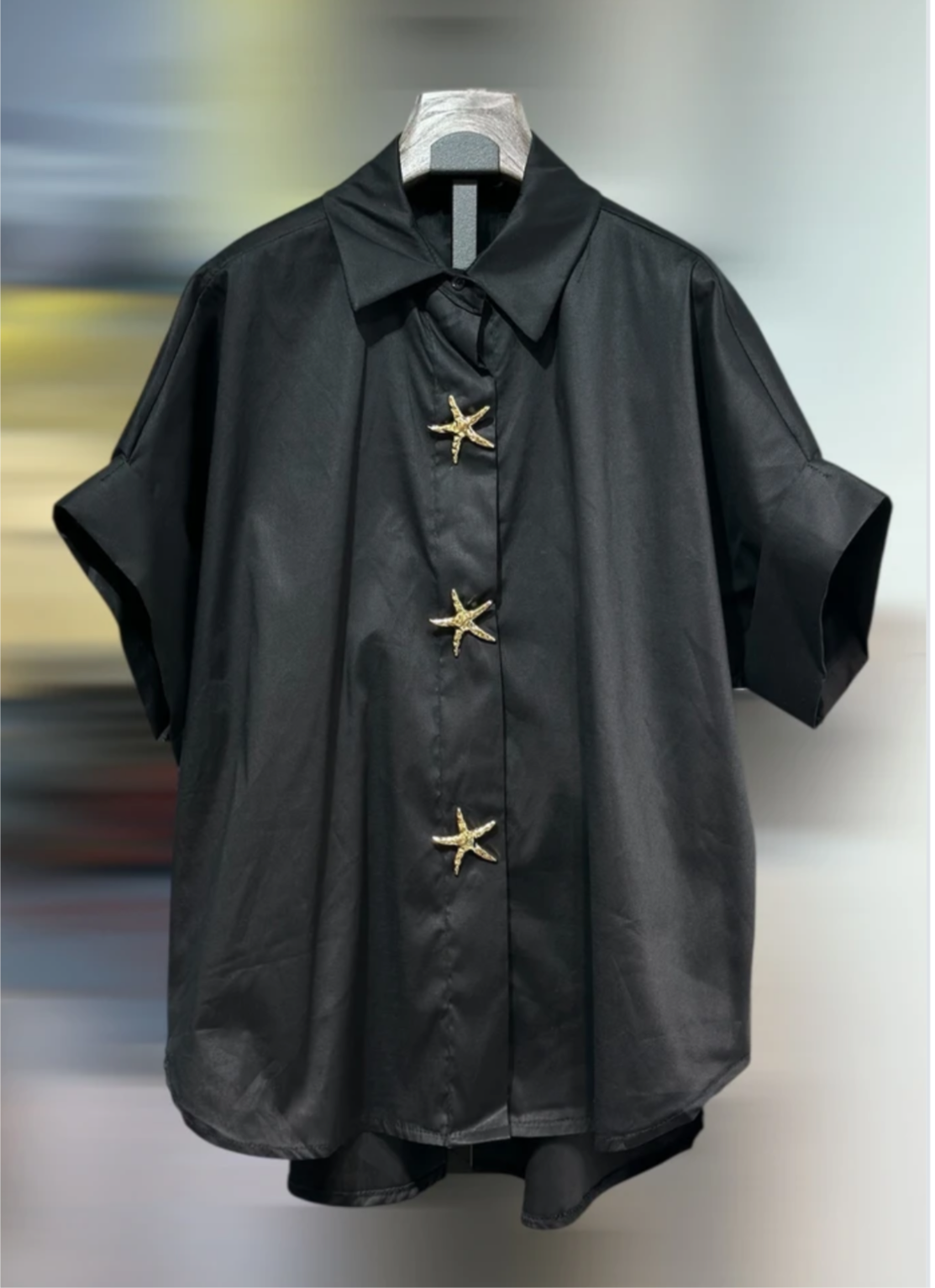 Chemise noire boutons étoile